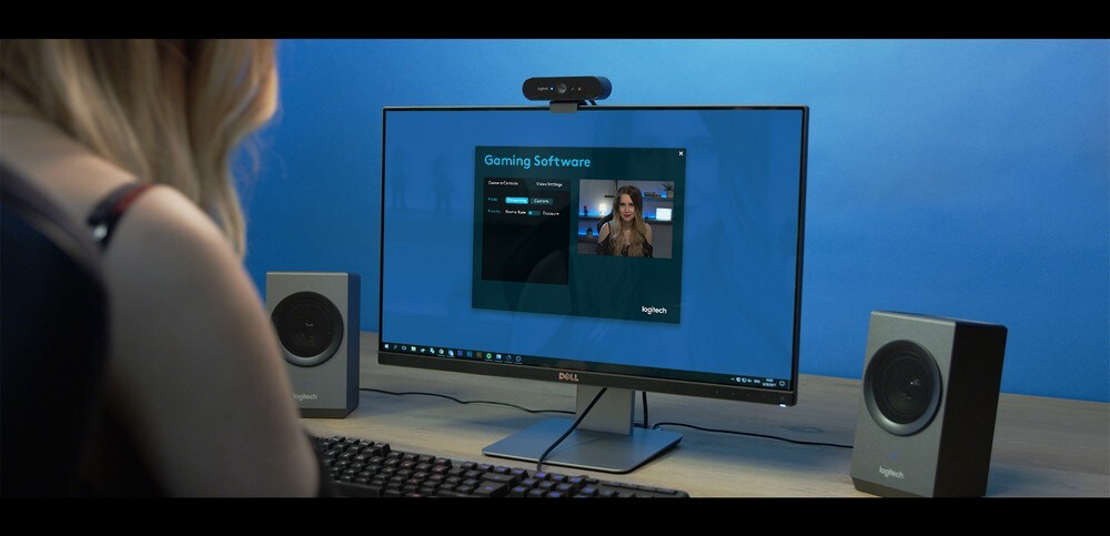 showing the camera on the monitor, talking on a communication program